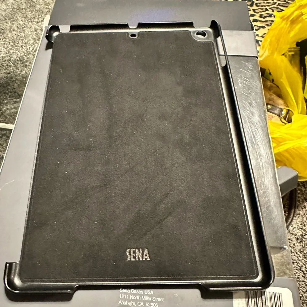 Black leather Ipad air case. Fits Ipad air and 9.7” Ipad. Brand new in the box.